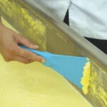 Espátula Plastica de mano Foto